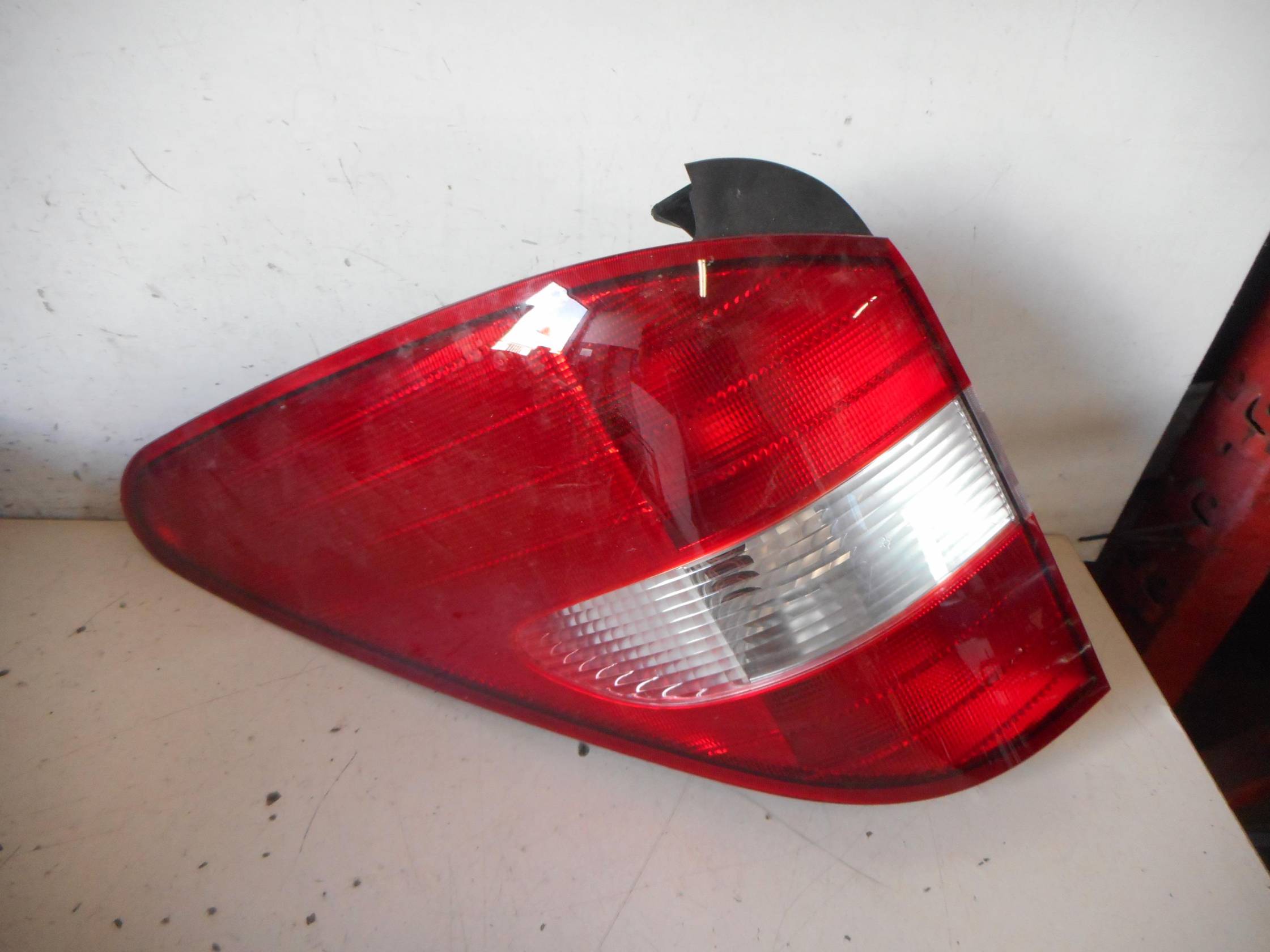 Fanale post. parte est. sx.